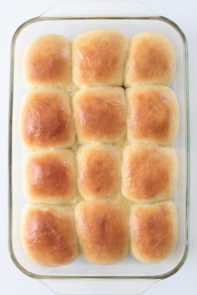 pan of baked rolls brushed with butter