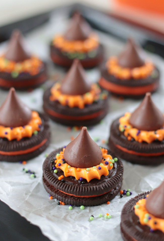 oreo witch hat cookies on parchment paper