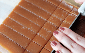 cutting caramel into small pieces