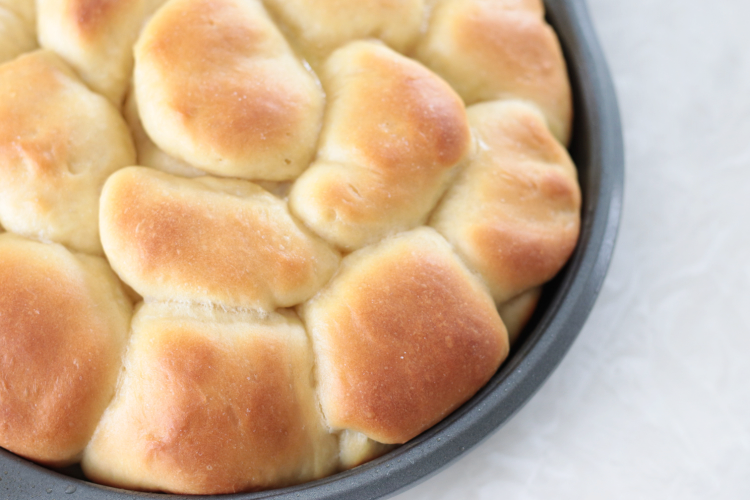 pan of baked Parker house rolls