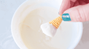 bugles halfway dipped in white candy melts