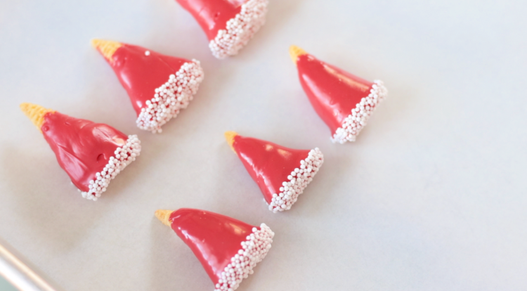bugles dipped in red candy melts and white sprinkles