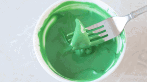 bugles dipped in green candy melts
