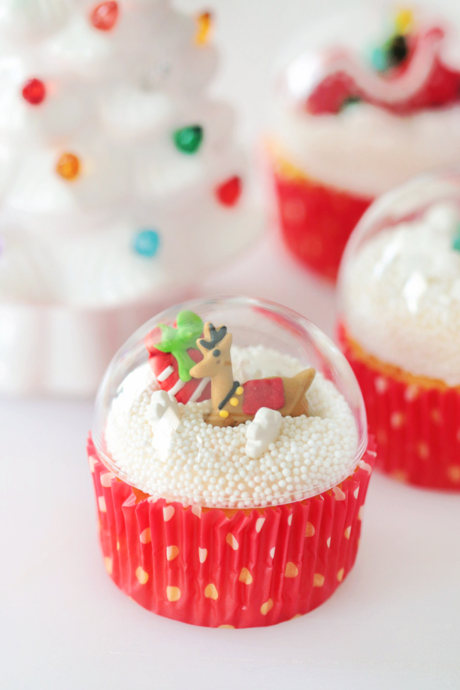 cupcake with plastic ornament dome on top
