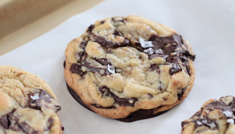 dipped chocolate chip cookie with salt flakes