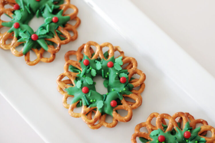 3 chocolate pretzel wreaths on a platter