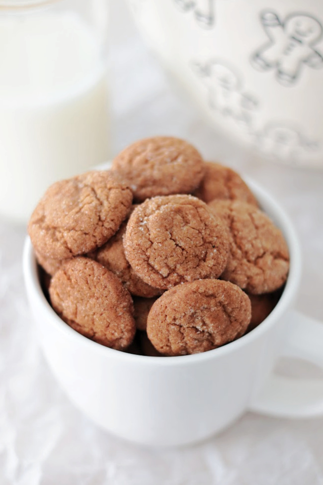 bowl of gingersnaps and a glass of milk