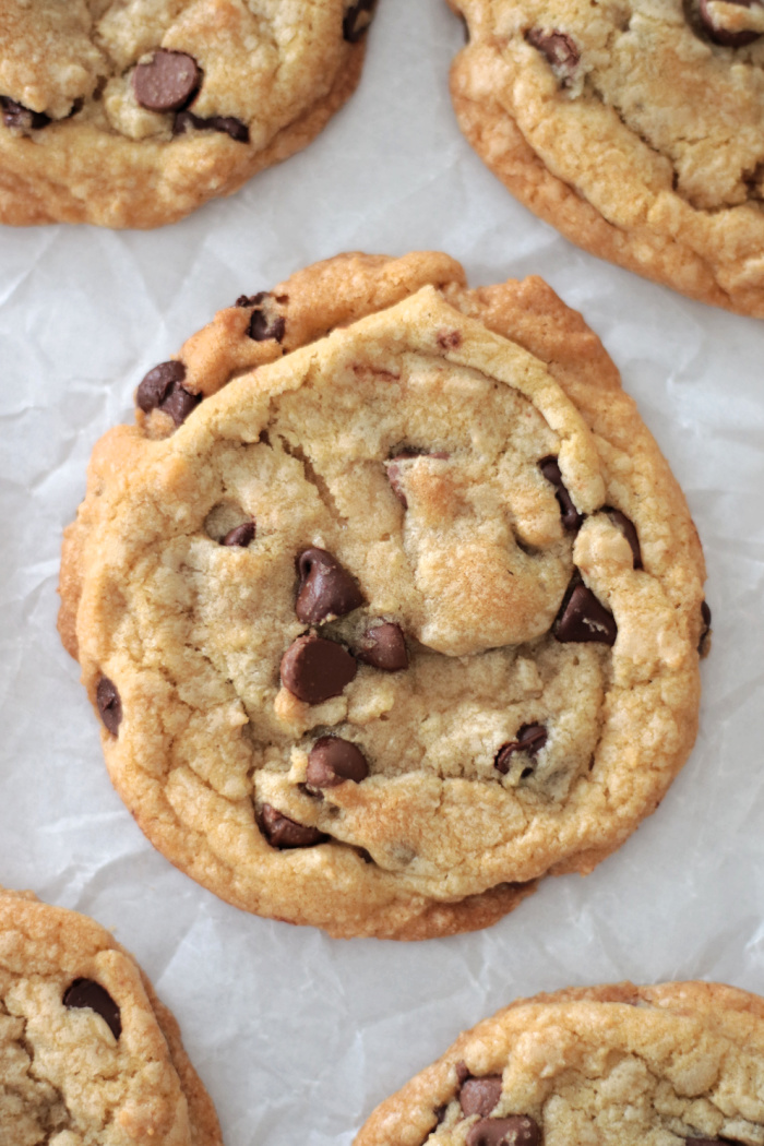 coconut oil chocolate chip cookies on parchment paper