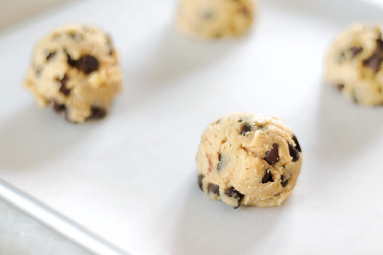 cookie sheet with cookie dough balls