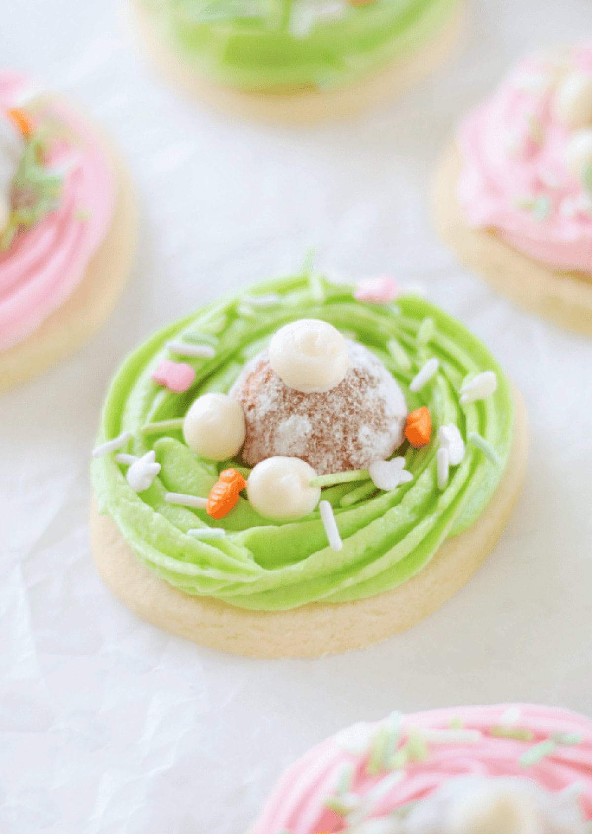 Bunny butt cookie with a donut hole on top.