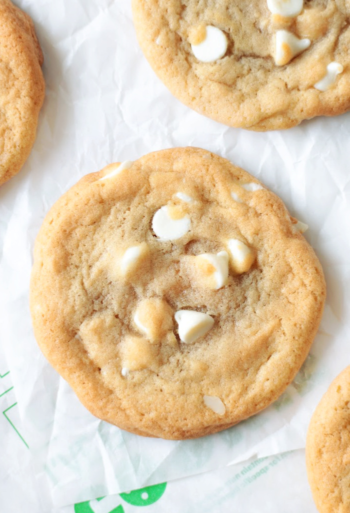 copycat subway white chocolate cookies on parchment paper