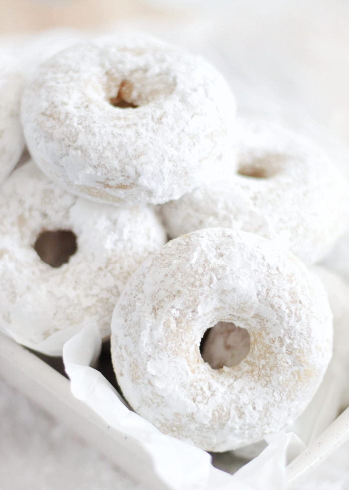 container of powdered donuts