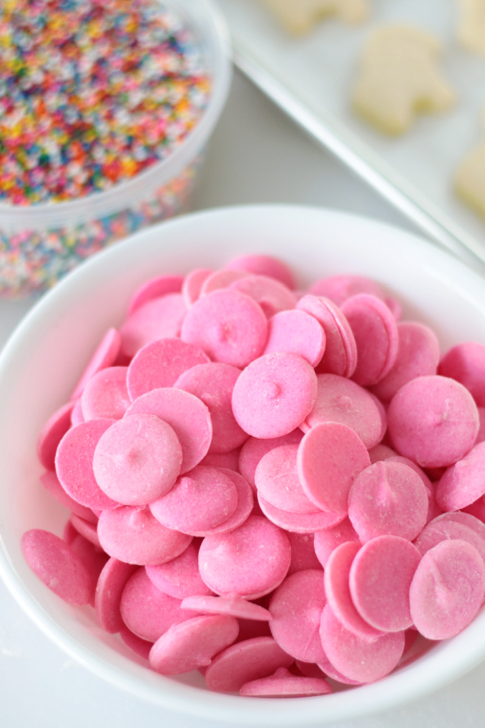 bowl of pink candy melts and sprinkles