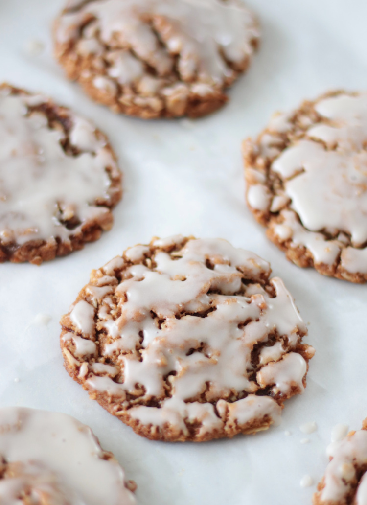 iced cookies on parchment paper