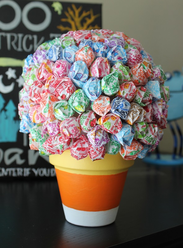 hallow lollipop topiary painted like candy corn