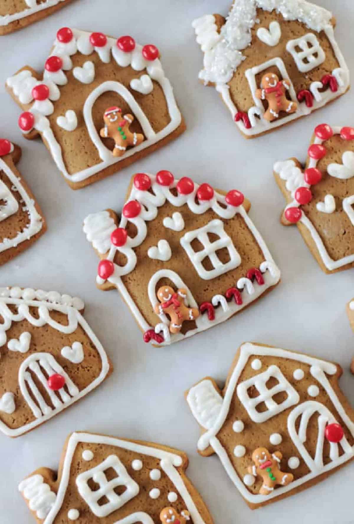 Decorated gingerbread house cookies.