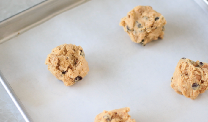 balls of cookie dough on baking sheet