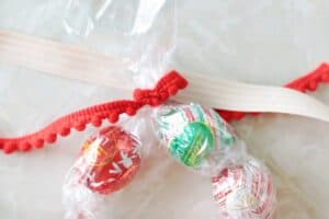 ribbon tied around ends of candy wreath