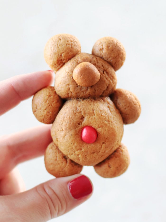 hand holding gingerbread cookies