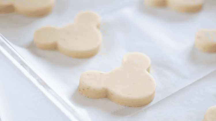 disney shortbread cookie dough cut into mickey mouse shapes