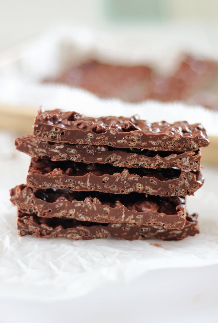 stack of crunch bars on parchment paper