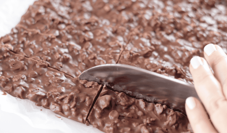 knife slicing meltaway crunch bars into bars