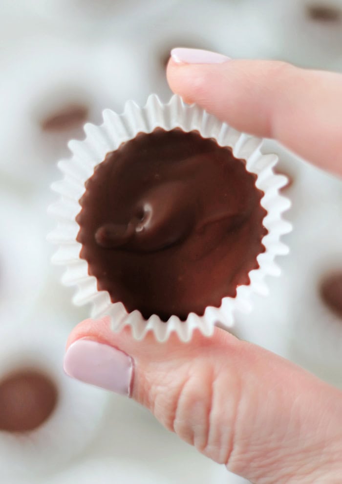 hand holding peanut butter cup