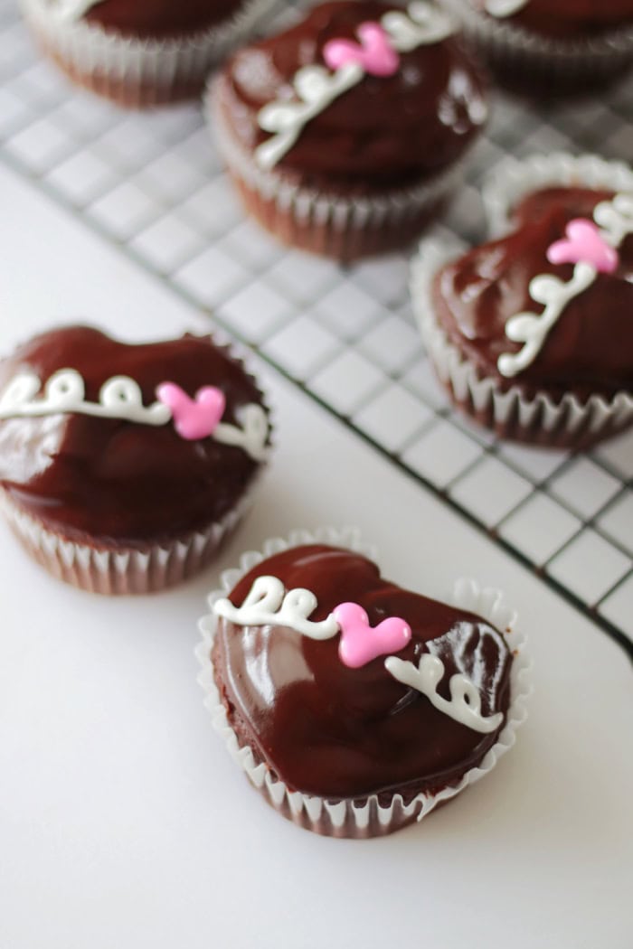 heart cupcakes on cooling rack and table