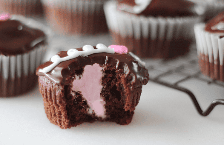 valentine hostess cupcake with bite taken out of it.