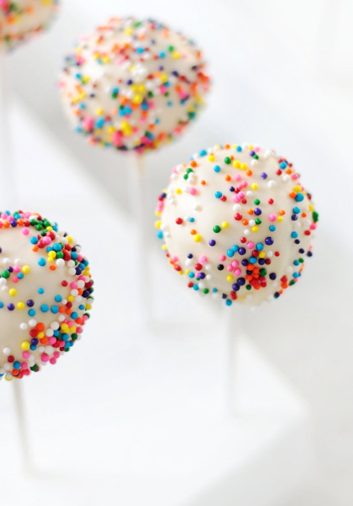 birthday cake pops on sticks stuck into styrofoam