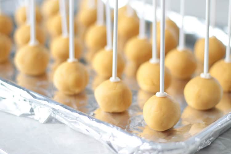 birthday cake pops on baking sheet