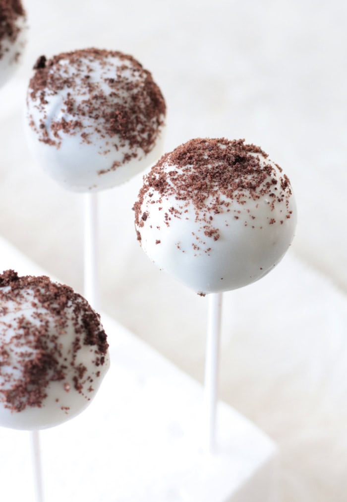 cookies and cream cake pops placed in styrofoam block