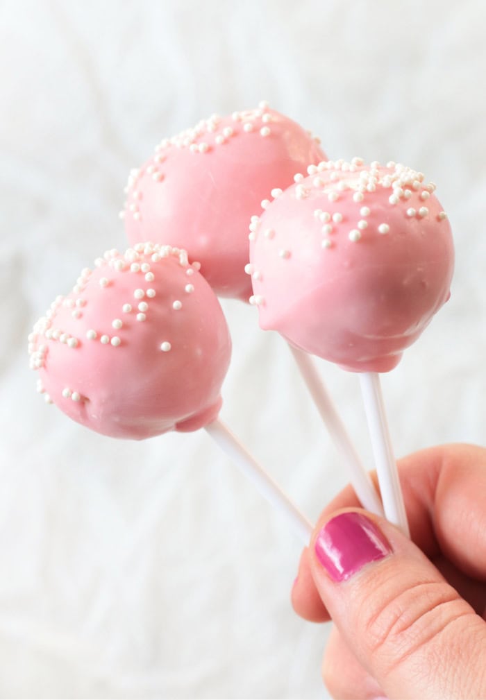 hand holding starbucks cake pops