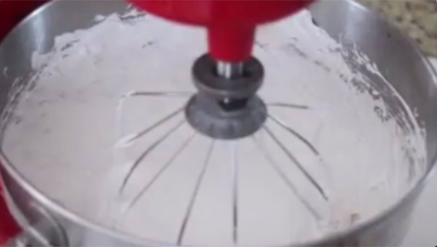 Stand mixer of marshmallow fluff mixture.