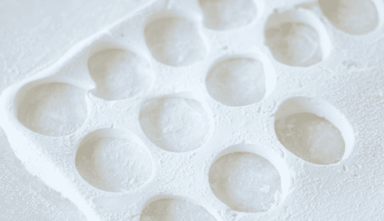 marshmallows with egg shapes cut from it