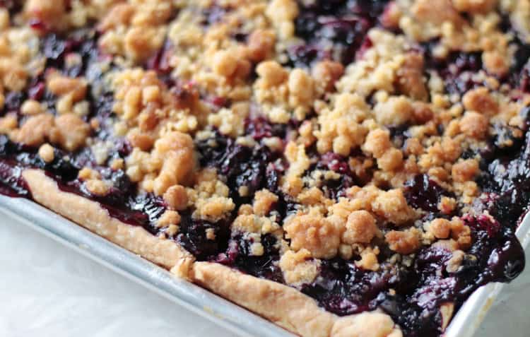 pan of sliced blueberry pie