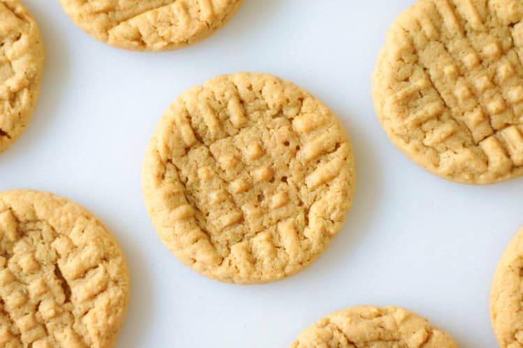 peanut butter cookies on white cutting board