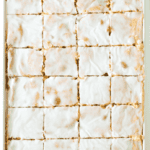 honey bun sheet cake cut into squares