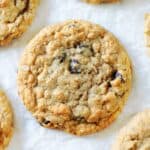 oatmeal raisin cookies on parchment paper