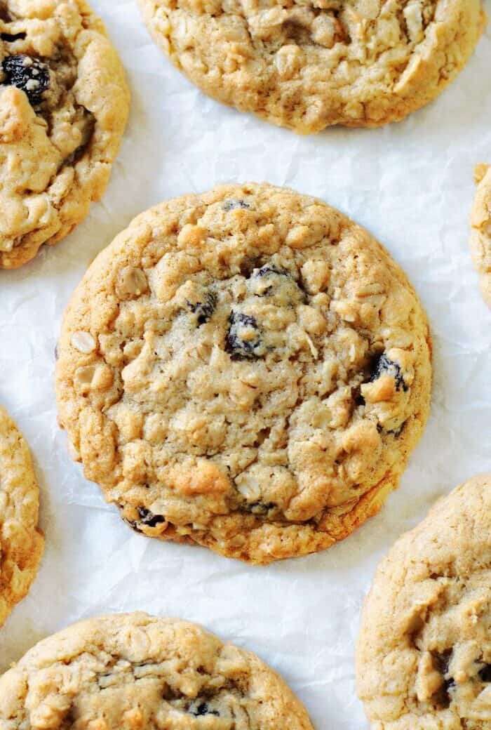 oatmeal raisin cookies on parchment paper