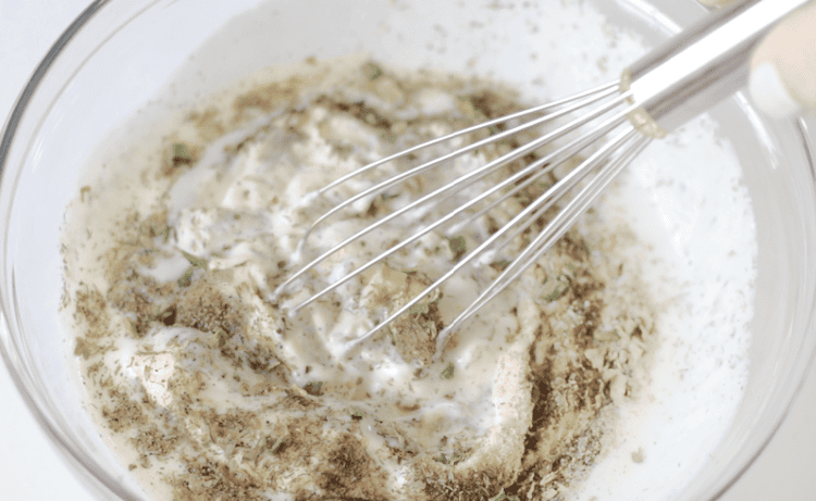 whisk mixing ranch dressing ingredients in bowl