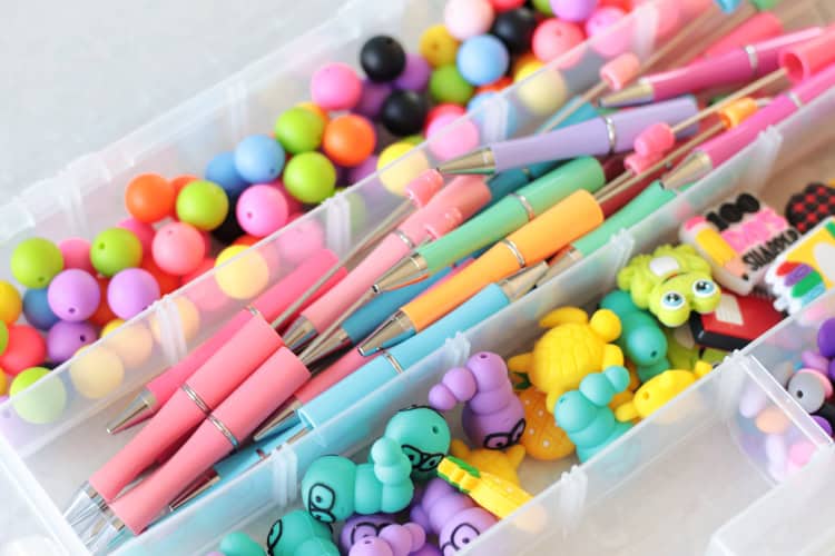 plastic organizer with pen blanks and silicone beads