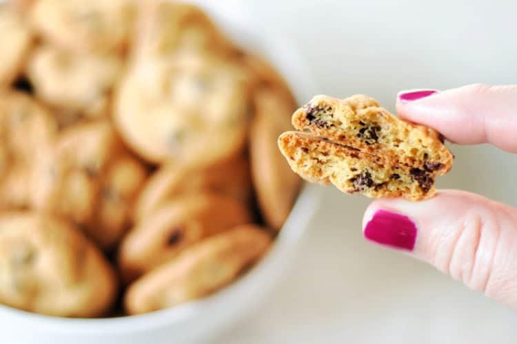 crispy chocolate chip cookies broken in half