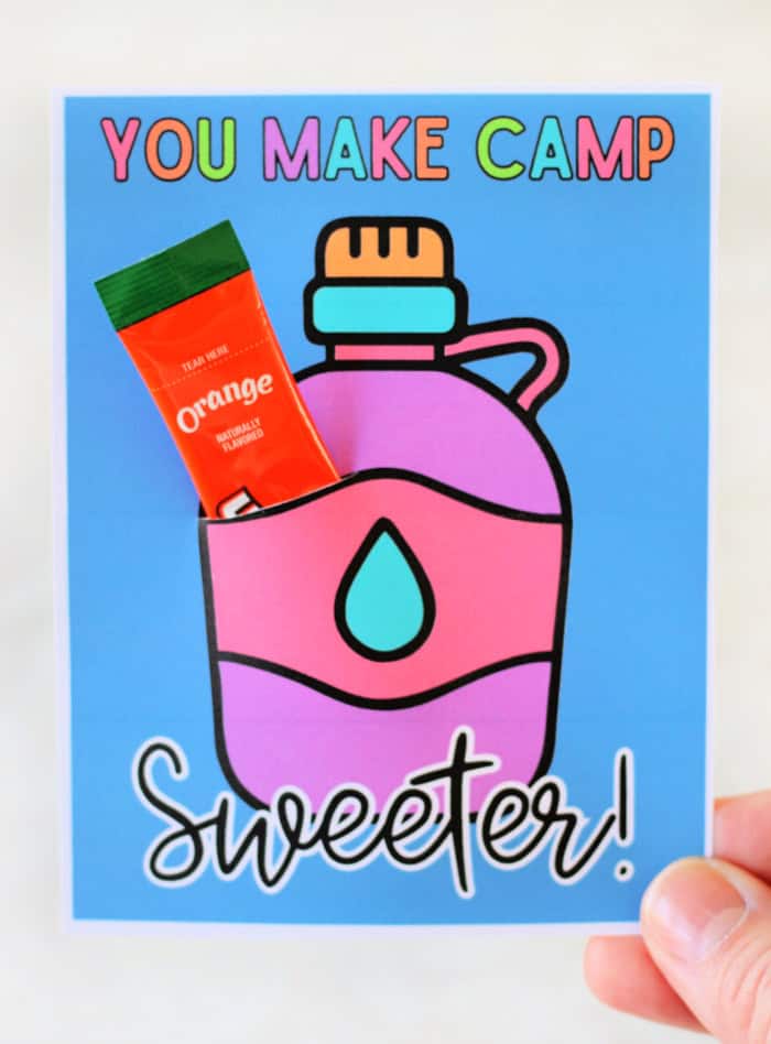 hand holding flavored water gift tag