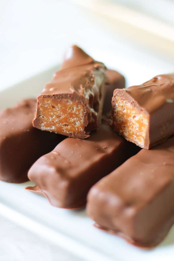 100 grand bars cut in half on plate