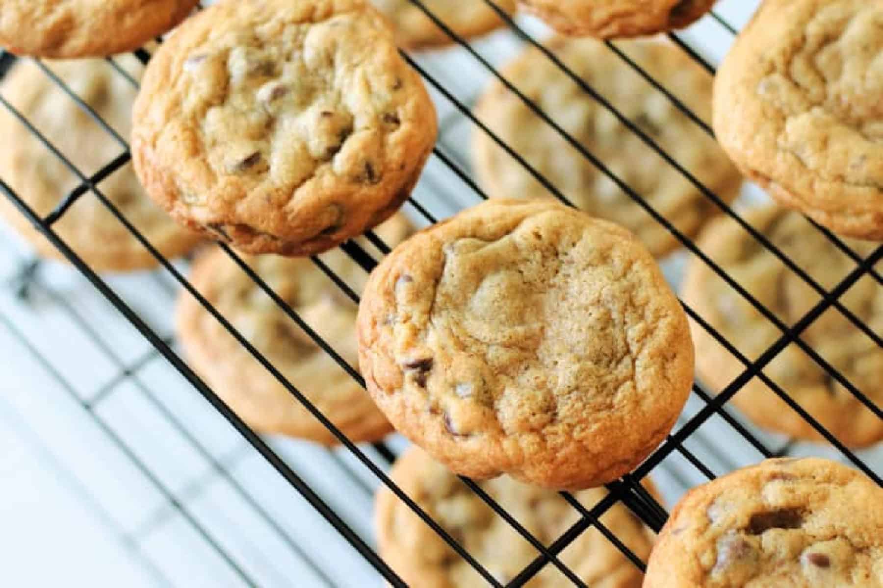 Mrs. Fields chocolate chip cookies on cooling rack.