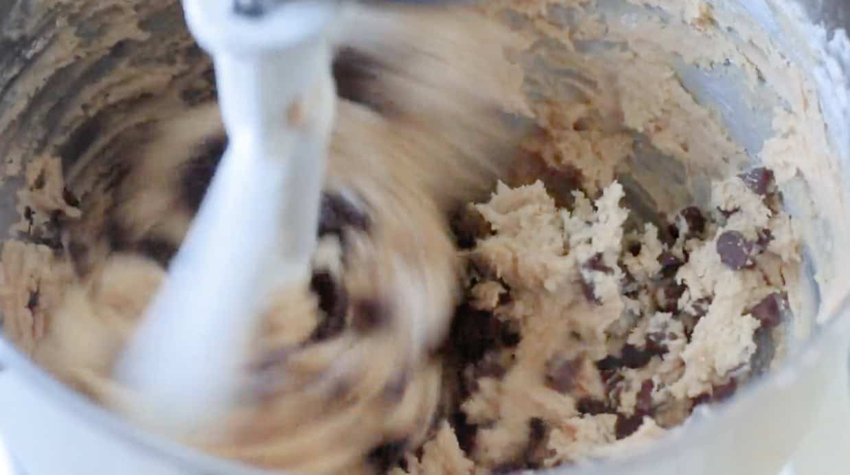 Chocolate chips mixed into cookie dough.