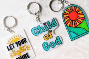3 YW camp shrinky dink keychains in varying designs