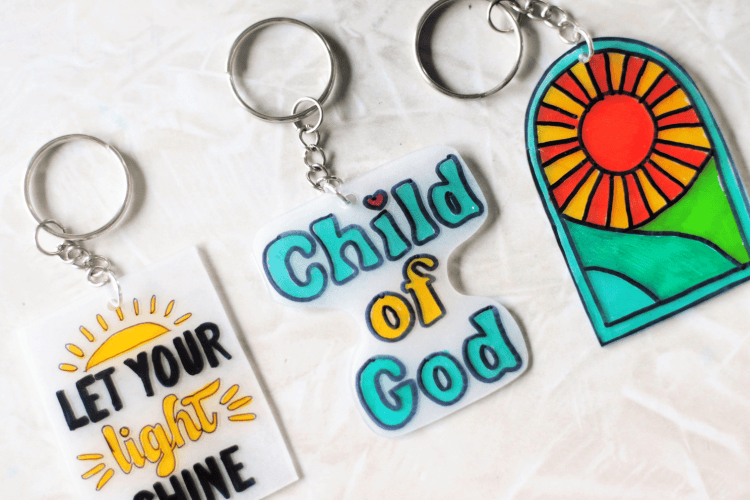 3 YW camp shrinky dink keychains in varying designs