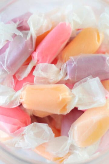 Salt water taffy candies in pastel colors.